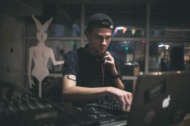 Alexey DJing at an event