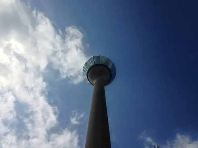 A television tower against a blue sky