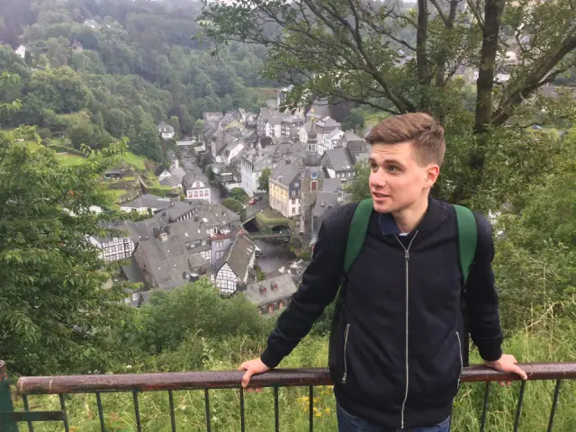 Alexey overlooking a hillside town
